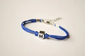 Blue cord bracelet for children with silver tone initial charm