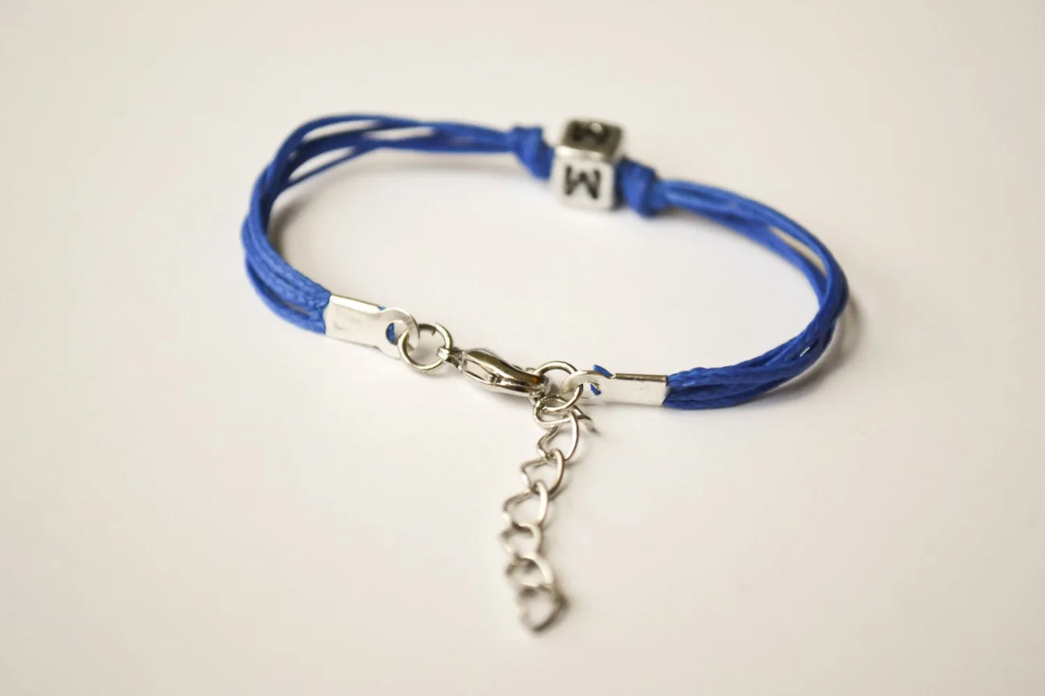 Blue cord bracelet for children with silver tone initial charm