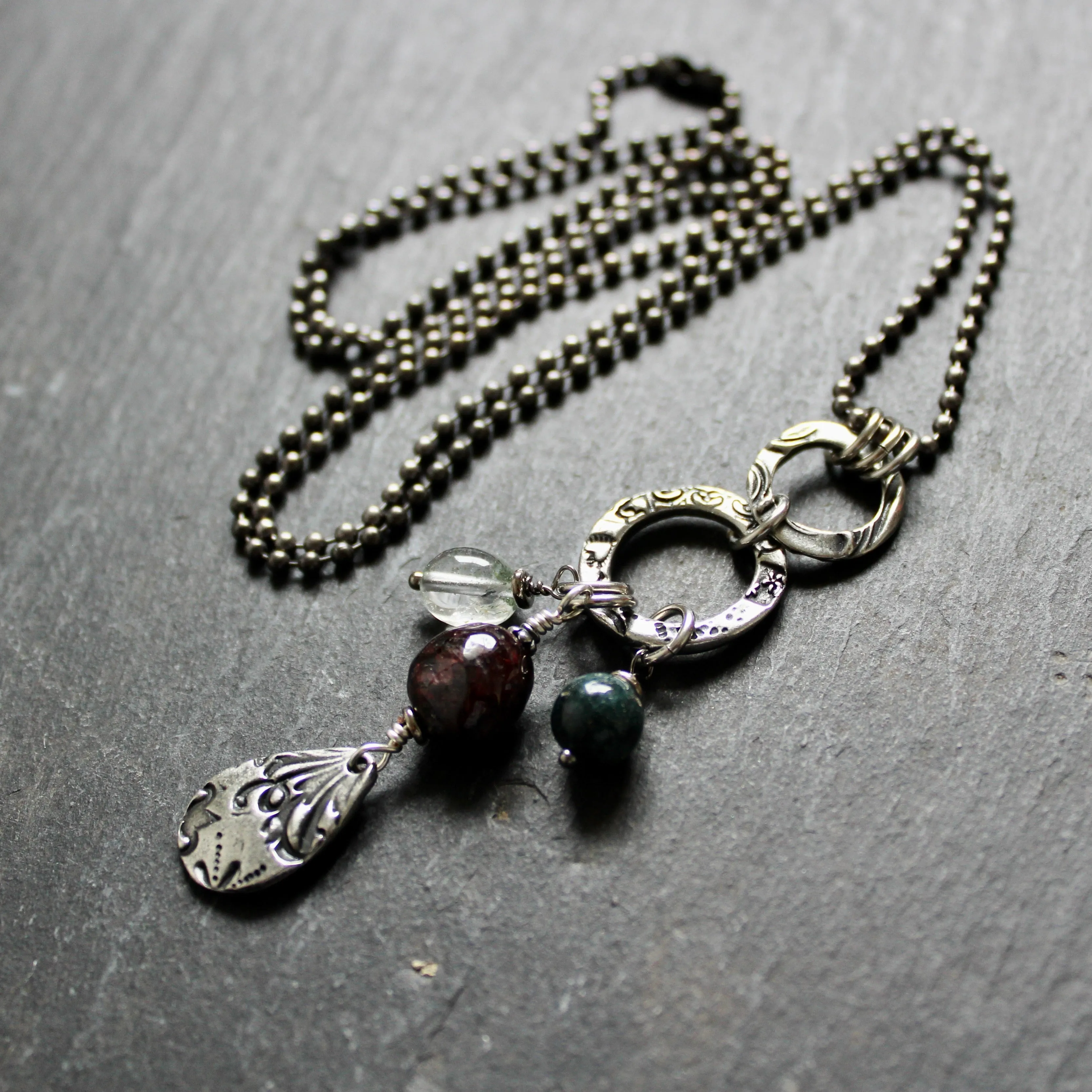 Glasgow Rose Cantrip Necklace with Agate and Garnet.